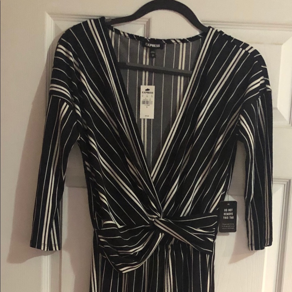 Black and white striped Express jumpsuit.